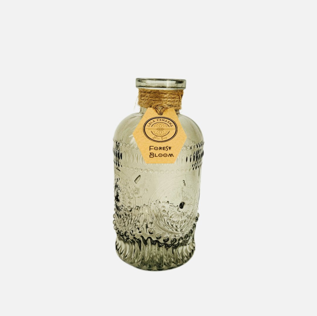 Dried flowers in a Jean bottle