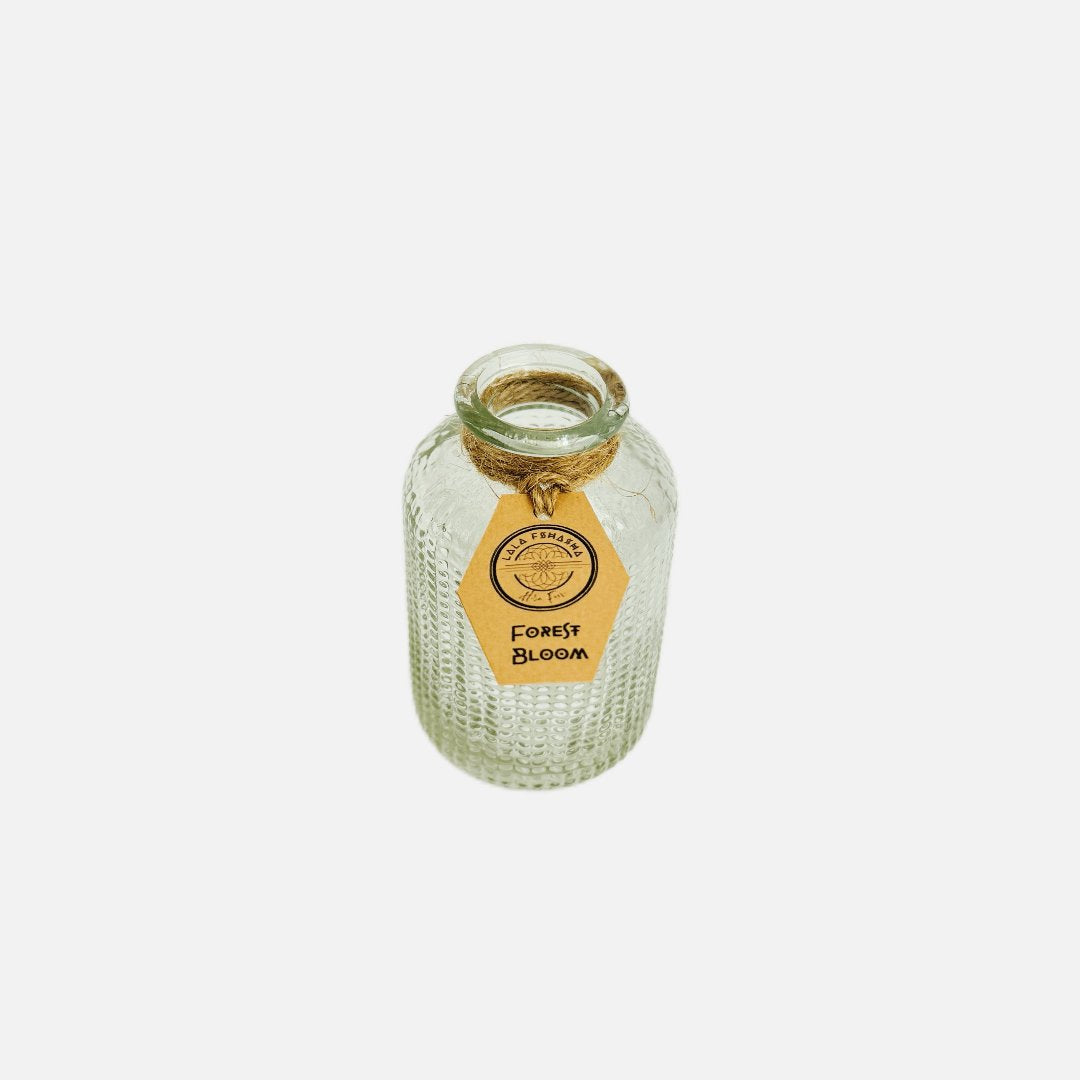 Dried flowers in a Raphael bottle