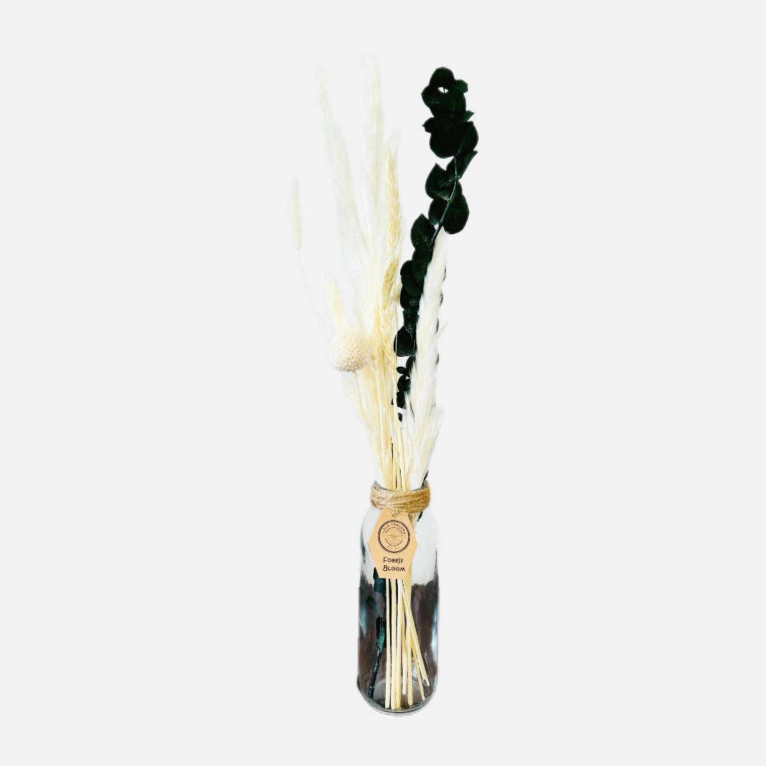 Dried flowers in a Ruth bottle