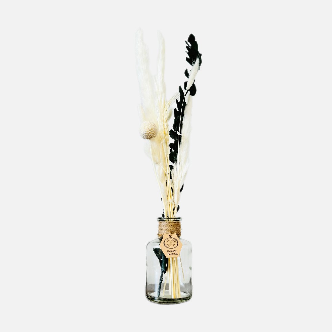 Dried flowers in a Tamar bottle
