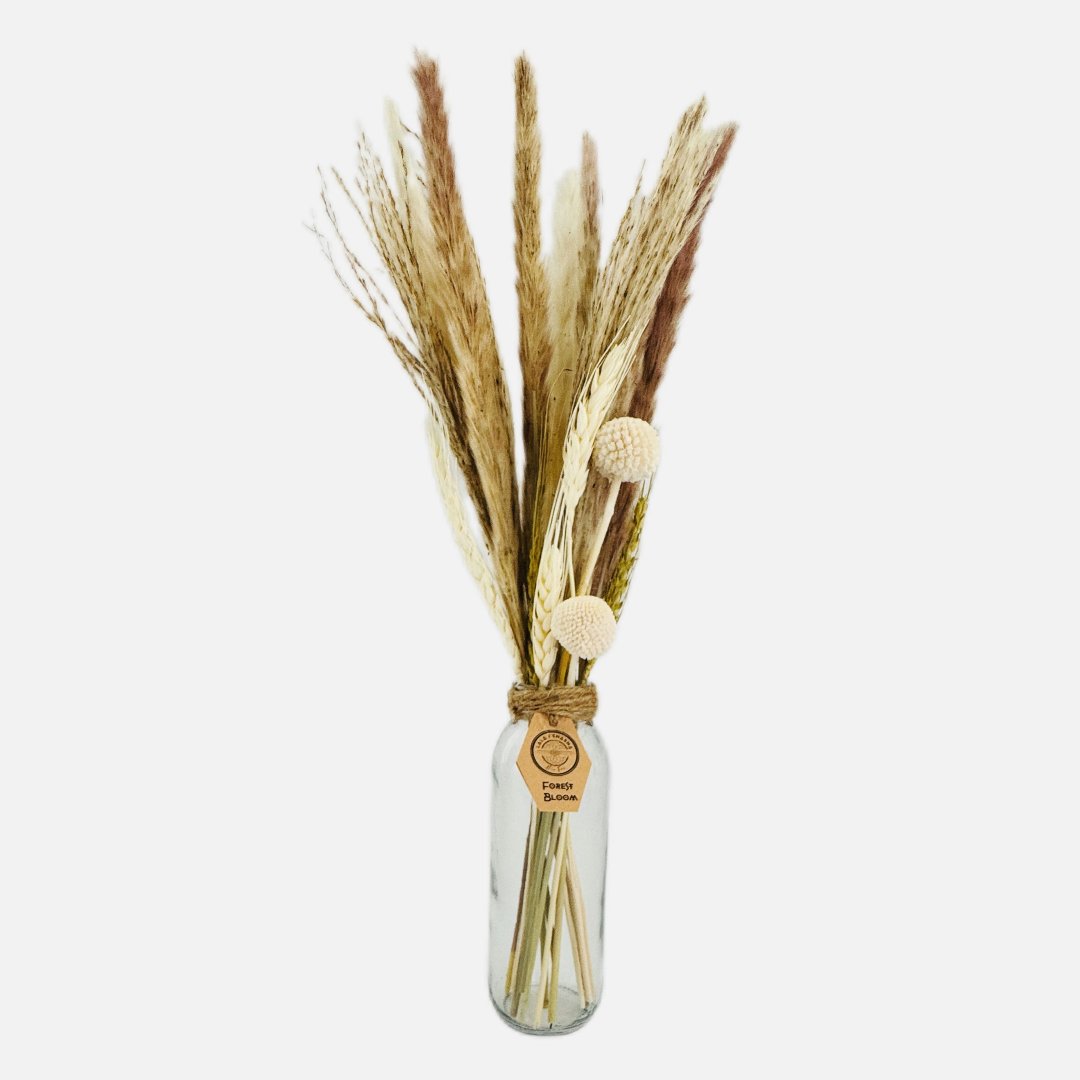 Dried flowers in a Ruth bottle