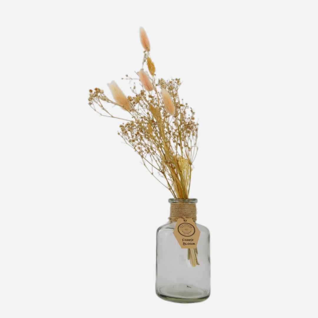 Dried flowers in a Tamar bottle