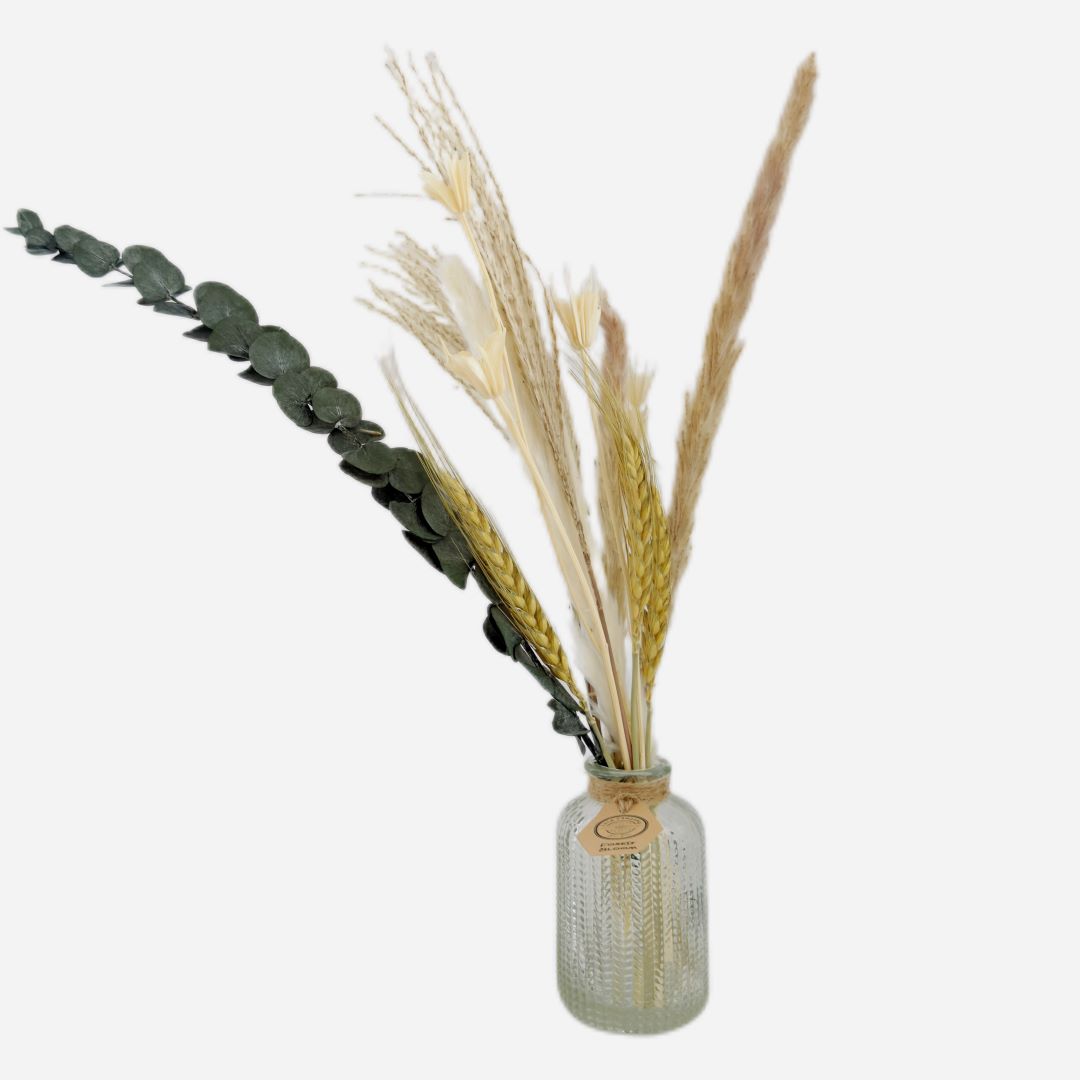 Dried flowers in a Raphael bottle