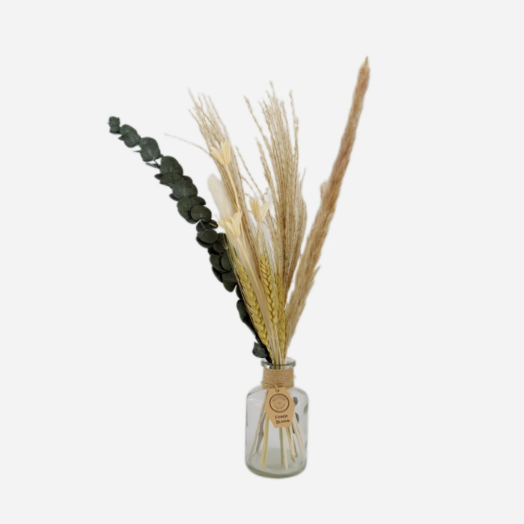 Dried flowers in a Tamar bottle